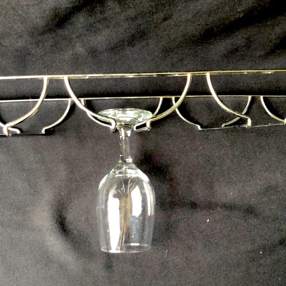 Martini glass , hurricane glass or wine glass rack holder.